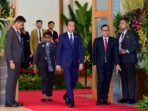 joko widodo menyambut kedatangan para pemimpin delegasi yang ccld